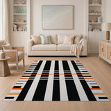Bold Black White Striped Area Rug with Orange Accents