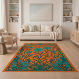 Teal Daisy Floral Area Rug on Vibrant Orange