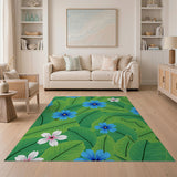 Vibrant Blue Flowers on Lush Green Leaves Area Rug