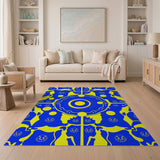 Vibrant Yellow Tribal Faces on Blue Area Rug