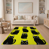 Playful Black Cats on Vibrant Yellow Area Rug