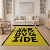 Yellow 'Vent Hit DVG IDE' Bold Block Letter Area Rug