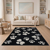 Playful White Paw Print Area Rug on Black