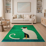 Playful Black Cat on Vibrant Green Area Rug