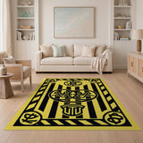 Bold Yellow Black Geometric Emblem Area Rug