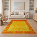 Vibrant Orange Sunburst Border Yellow Area Rug