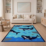 Playful Cartoon Whales Ocean Area Rug