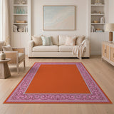 Vibrant Orange Area Rug with Pink Ornate Border
