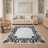 Black and White Ornate Black Floral Frame Area Rug