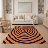 Hypnotic Orange Spiral Area Rug with Black Swirls