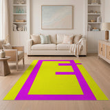 Vibrant Yellow and Pink Geometric E Pattern Area Rug