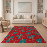 Vibrant Teal Leaves on Red Area Rug