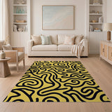 Bold Yellow Abstract Area Rug with Black Waves