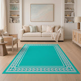Teal Area Rug with Ornate White Heritage Borders
