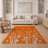White Dandelion Silhouettes on Vibrant Orange Area Rug