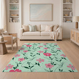 Whimsical Pink Flowers on Mint Green Rug