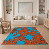 Vibrant Blue Splatter on Orange Abstract Area Rug