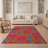 Vibrant Pink Teal Flowers on Orange Area Rug