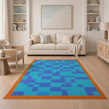 Teal Blue Geometric Grid Area Rug with Orange Border