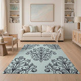 Elegant Black Damask Floral Area Rug on Light Blue