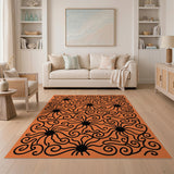 Bold Black Swirls on Vibrant Orange Area Rug