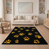Black Area Rug with Scattered Yellow Paw Prints