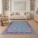 Teal Persian Area Rug with Pink Floral Motifs