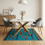 Vibrant Fish Swimming Teal Area Rug
