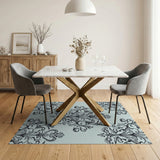 Elegant Black Damask Floral Area Rug on Light Blue