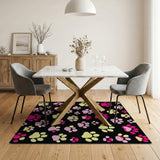 Playful Pink Yellow Paw Prints Black Area Rug