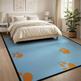 Playful Orange Paw Print Blue Area Rug
