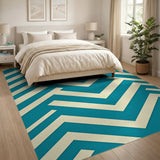 Teal and Ivory Interlocking Geometric Area Rug
