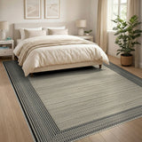 Beige Area Rug with Black Tassel Border