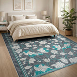 Elegant Grey Area Rug with White Leaf Motifs and Teal Accents