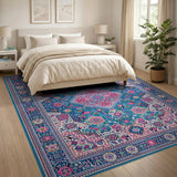 Vibrant Teal Persian Area Rug with Pink Motifs
