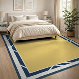 Yellow Area Rug with Navy Geometric Border