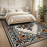 Ornate Cream Area Rug with Orange Fleur-de-Lis Border