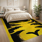 Vibrant Yellow Rug with Bold Black Tribal Silhouettes