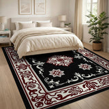 Ornate Black Persian Area Rug with Red Borders