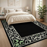 Ornate Black Area Rug with Green Floral Border
