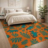 Playful Teal Foxes on Vibrant Orange Leaf Rug