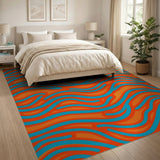 Vibrant Teal Orange Wavy Area Rug