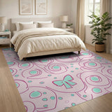 Whimsical Pink Bow and Swirl Area Rug