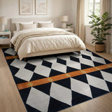 Black White Harlequin Diamond Area Rug with Orange Bands