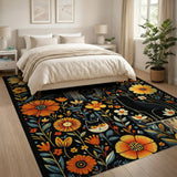 Black Cats Amidst Vibrant Orange Flowers Rug