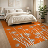White Dandelion Silhouettes on Vibrant Orange Area Rug