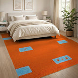 Vibrant Orange Shag Area Rug with Blue Geometric Patches