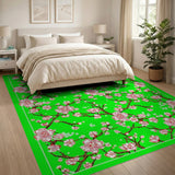 Pink Cherry Blossom on Vibrant Green Area Rug