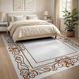 Brown and Tan Ornate Bronze Floral Frame Area Rug