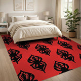 Vibrant Red Area Rug with Black Flame Motifs